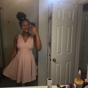 A pink dress mid length dress